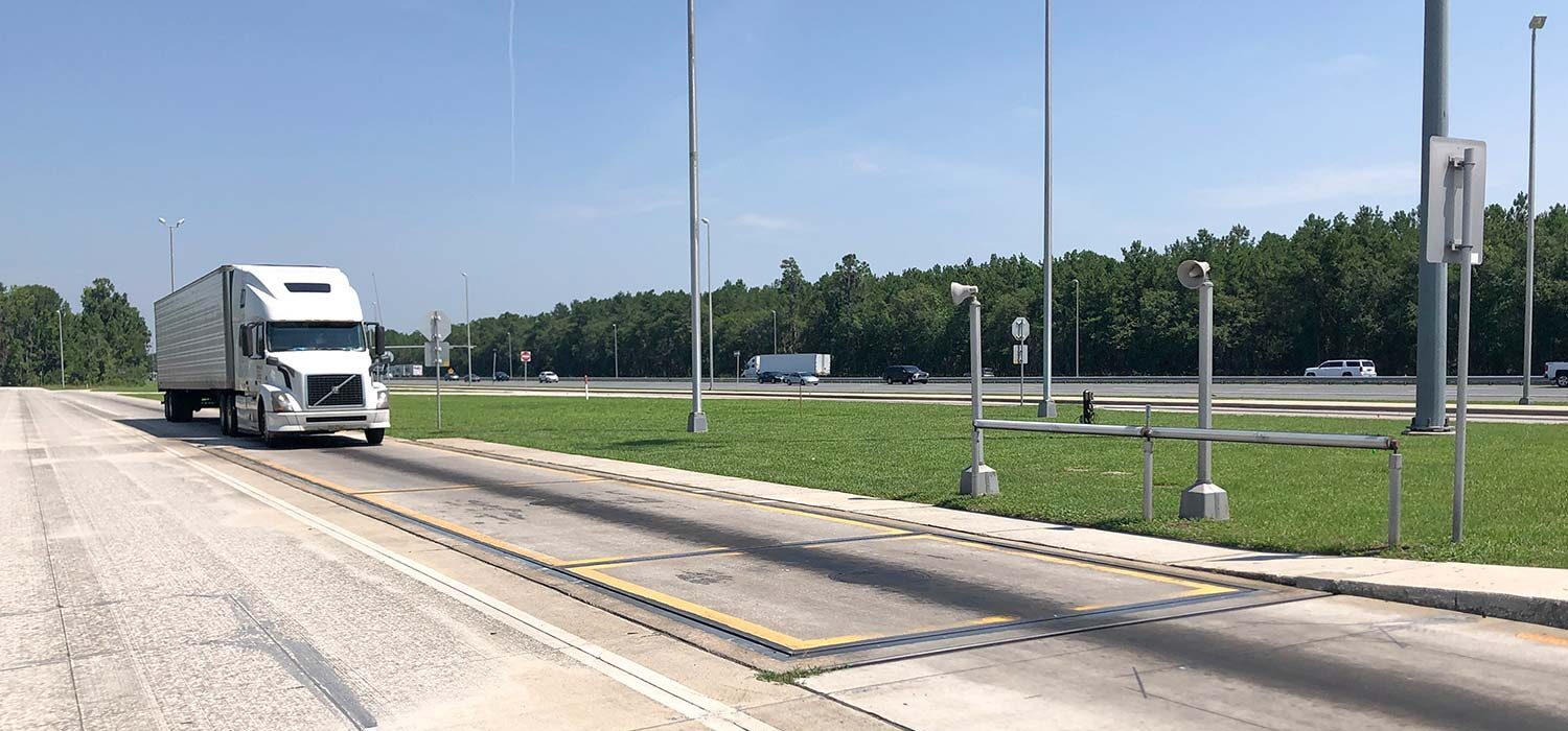 truck entering motor carrier on the road